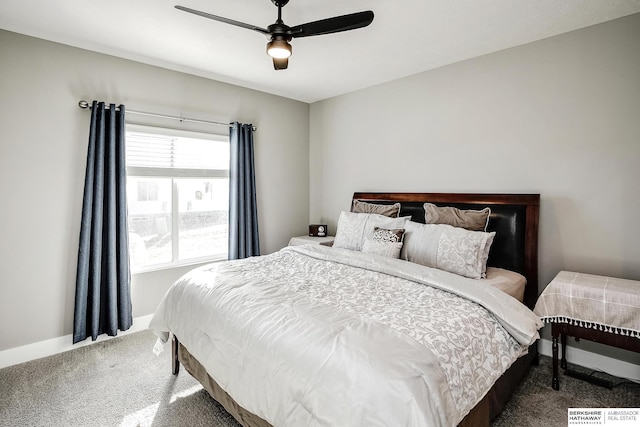 carpeted bedroom featuring a ceiling fan and baseboards