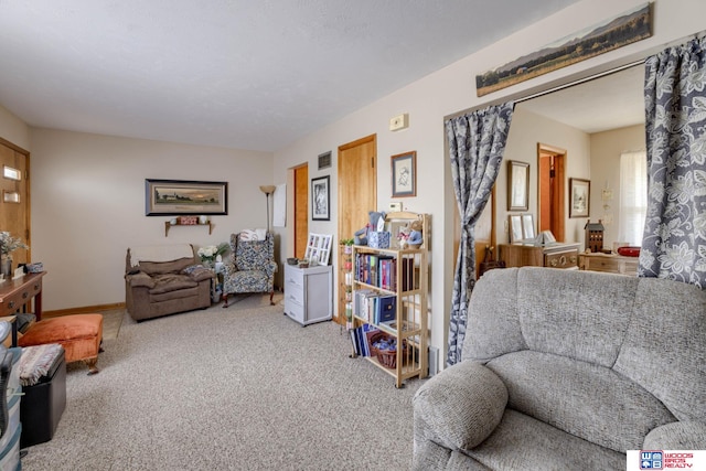 4821-31-41 Colfax Ave, Lincoln, NE 68504 - carpeted living room featuring baseboards