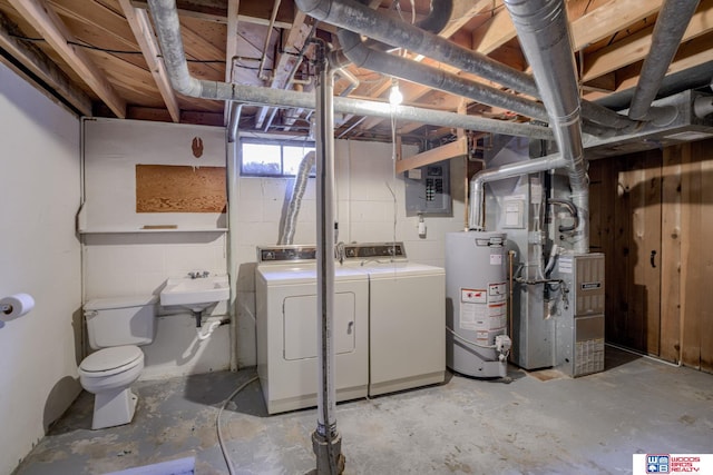 4821-31-41 Colfax Ave, Lincoln, NE 68504 - unfinished basement with washer and dryer, water heater, a sink, and heating unit