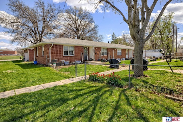 4821-31-41 Colfax Ave, Lincoln, NE 68504 - ranch-style home featuring brick siding, a front lawn, fence private yard, and a gate
