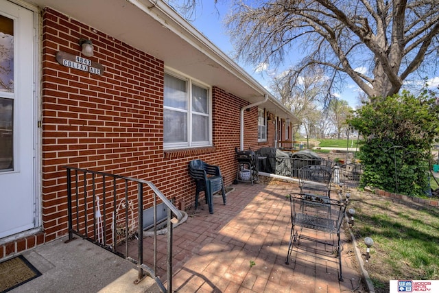 4821-31-41 Colfax Ave, Lincoln, NE 68504 - wooden terrace featuring a patio