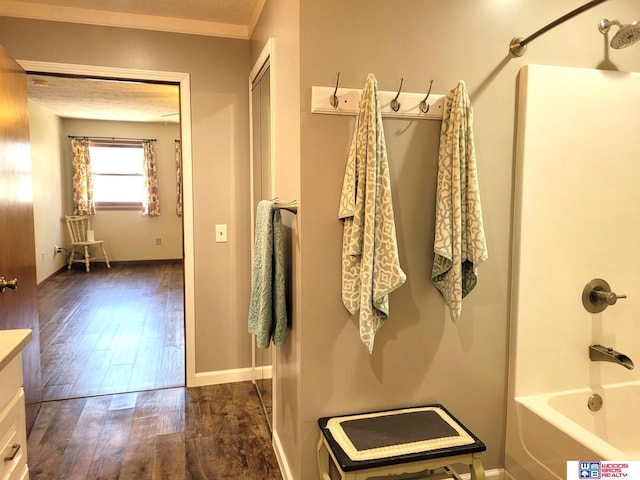 1321 Frances St, Goehner, NE 68364 - full bath featuring hardwood / wood-style flooring, baseboards, vanity, and  shower combination