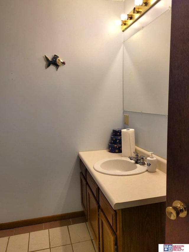 1321 Frances St, Goehner, NE 68364 - bathroom with baseboards, vanity, and tile patterned floors