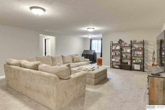 living room featuring light carpet, a textured ceiling, and baseboards