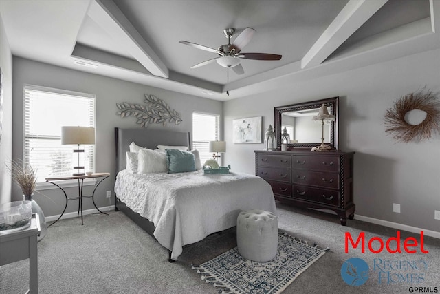 bedroom featuring ceiling fan, a raised ceiling, baseboards, carpet flooring, and visible vents
