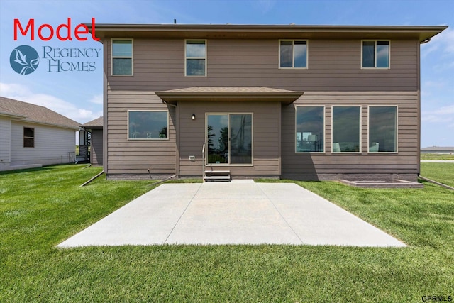 rear view of house with a lawn and a patio