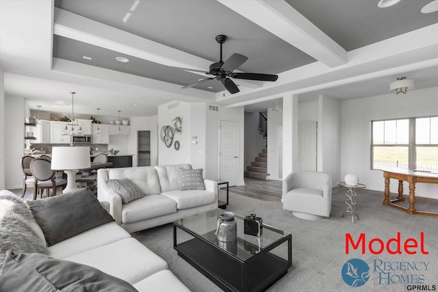 carpeted living area with recessed lighting, beam ceiling, a ceiling fan, and stairs