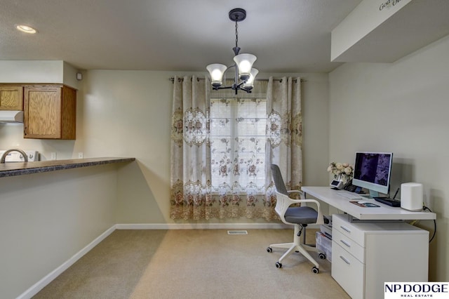 carpeted office space with baseboards, recessed lighting, and a chandelier
