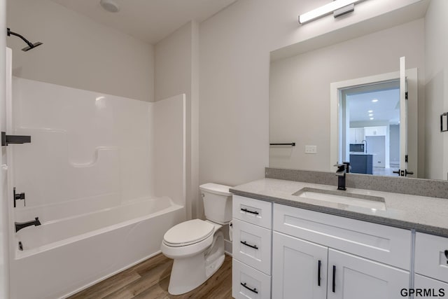 5406 N 196th St, Elkhorn, NE 68022 - full bathroom featuring vanity, wood finished floors, and shower / tub combination