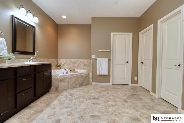 9441 Southern Sky Cir, Lincoln, NE 68505 - bathroom with a garden tub and vanity