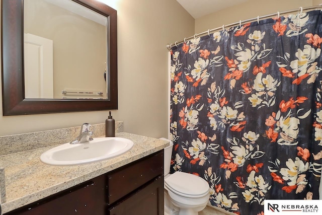 9441 Southern Sky Cir, Lincoln, NE 68505 - full bathroom featuring toilet, vanity, and curtained shower