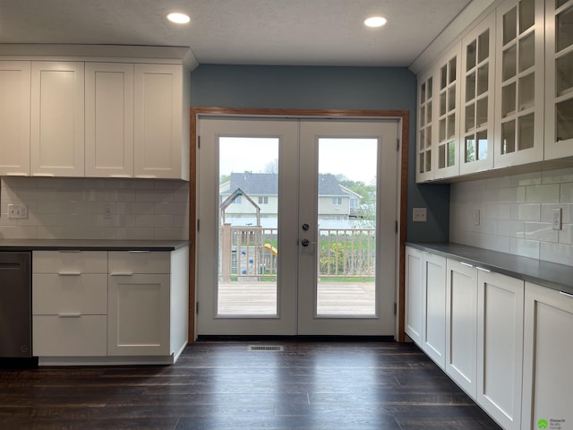 interior space featuring visible vents, dark wood-style flooring, french doors, and recessed lighting