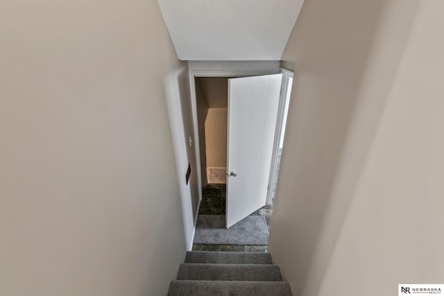 2725 Monroe St, Omaha, NE 68107 - stairs featuring carpet