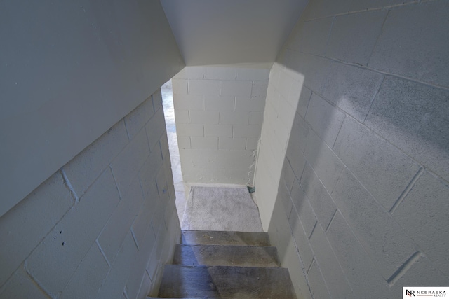 2725 Monroe St, Omaha, NE 68107 - stairs featuring concrete block wall