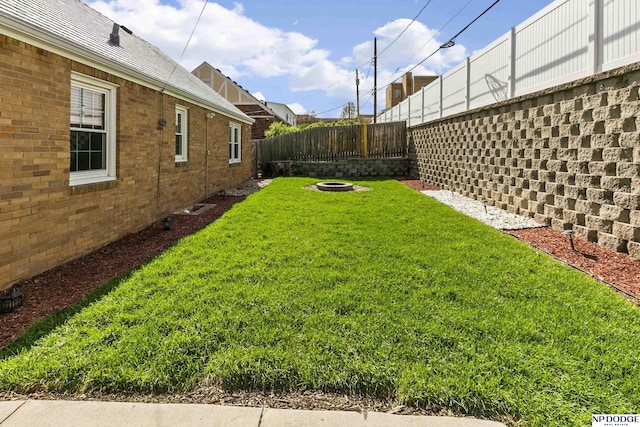 view of yard featuring a fenced backyard