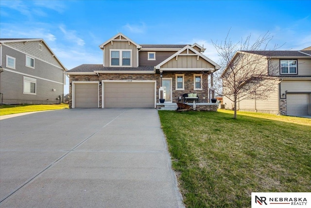 craftsman house with a front lawn, stone siding, covered porch, concrete driveway, and board and batten siding