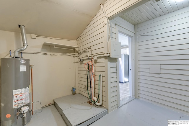 interior space with water heater and electric panel