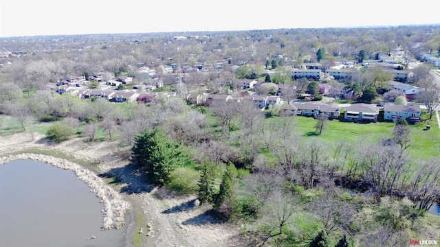 bird's eye view with a residential view and a water view