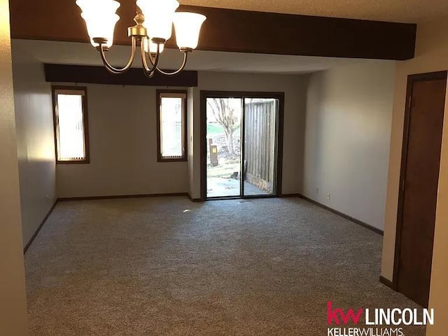 2219 Southwood Pl, Lincoln, NE 68512 - empty room with a chandelier, light colored carpet, and baseboards