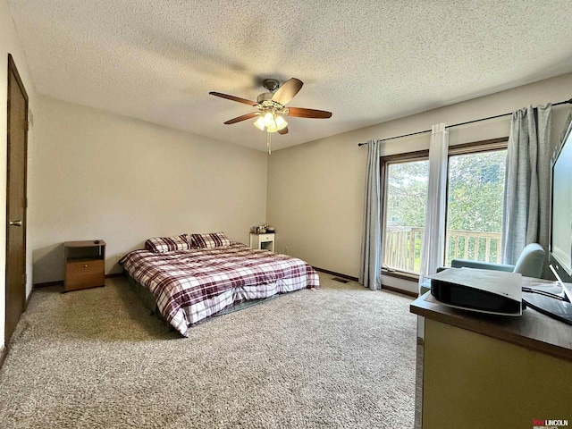 2219 Southwood Pl, Lincoln, NE 68512 - bedroom with carpet flooring, a textured ceiling, and a ceiling fan