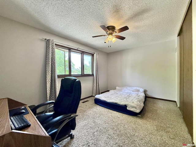2219 Southwood Pl, Lincoln, NE 68512 - bedroom featuring carpet, a desk, a textured ceiling, baseboards, and ceiling fan