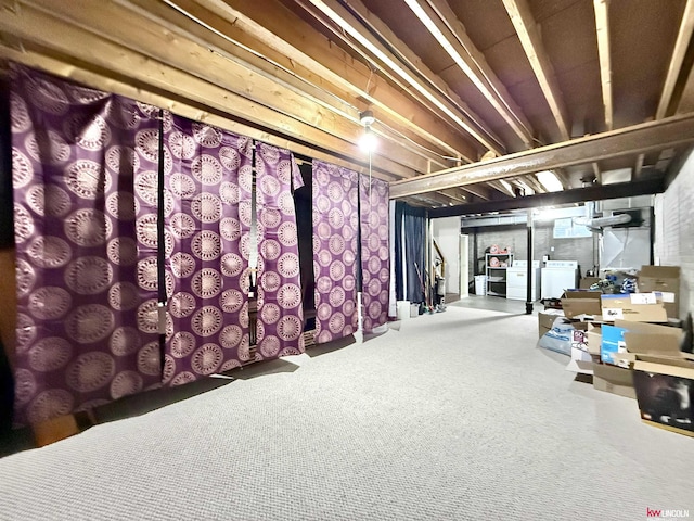 2219 Southwood Pl, Lincoln, NE 68512 - unfinished basement featuring separate washer and dryer and carpet