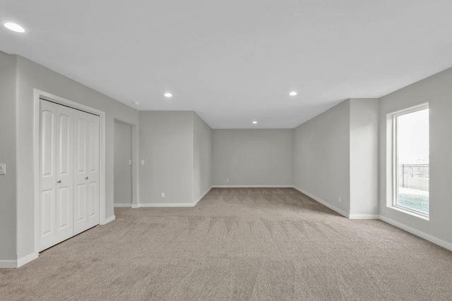 interior space featuring baseboards, carpet floors, and recessed lighting