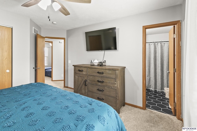 bedroom featuring visible vents, a ceiling fan, baseboards, and light carpet
