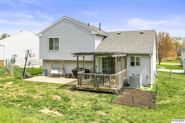 rear view of house featuring a fenced backyard, a pergola, central air condition unit, a shingled roof, and a yard
