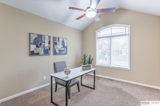 office area with carpet flooring, a ceiling fan, baseboards, and vaulted ceiling