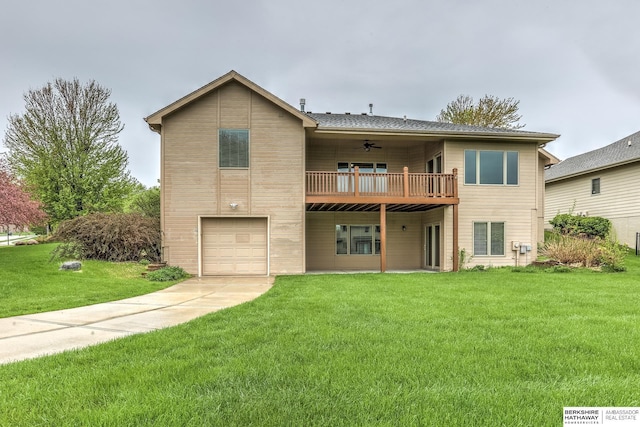 rear view of property featuring an attached garage, a balcony, a yard, and concrete driveway