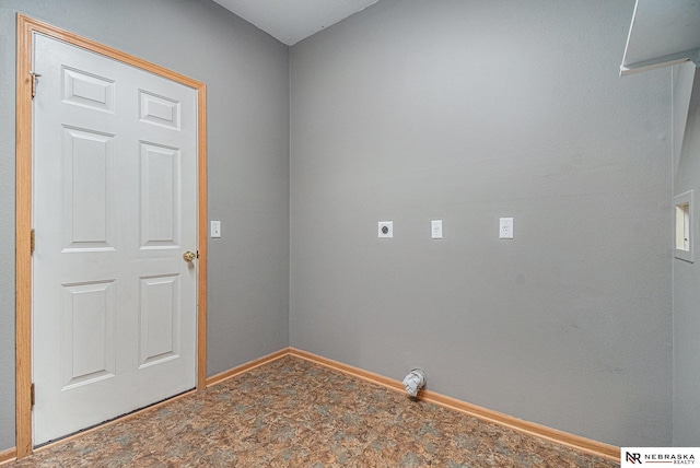 laundry room featuring baseboards, laundry area, electric dryer hookup, and carpet
