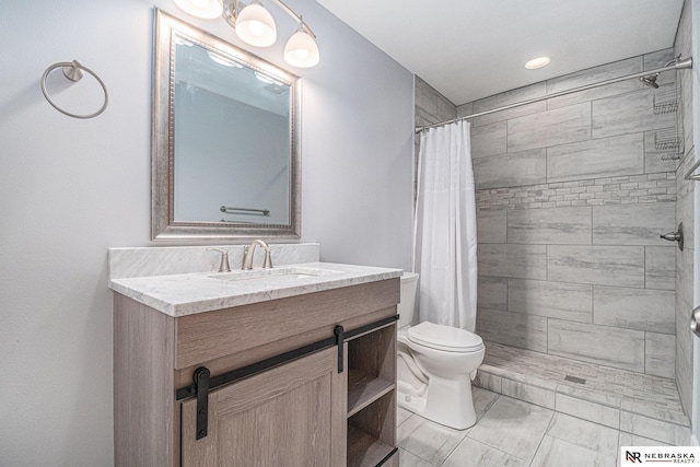 full bath with toilet, a tile shower, marble finish floor, and vanity
