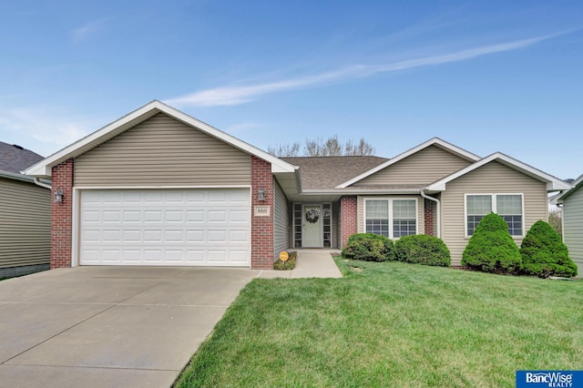 ranch-style house featuring brick siding, driveway, roof with shingles, a front yard, and an attached garage