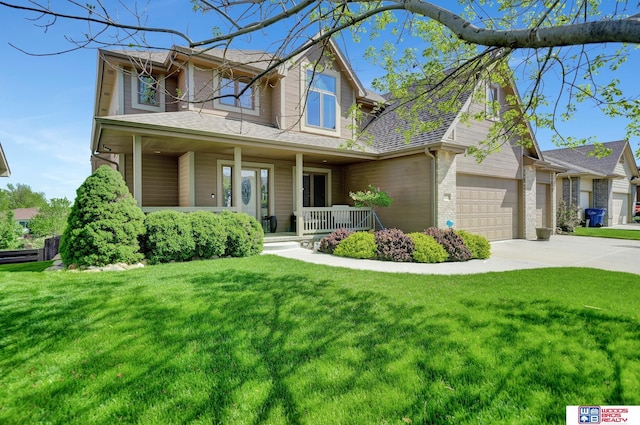 view of front of property with a porch, a front lawn, driveway, a garage, and brick siding