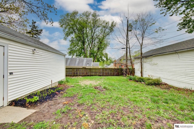 view of yard with fence