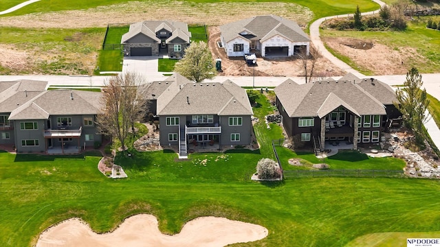 aerial view with a residential view and golf course view