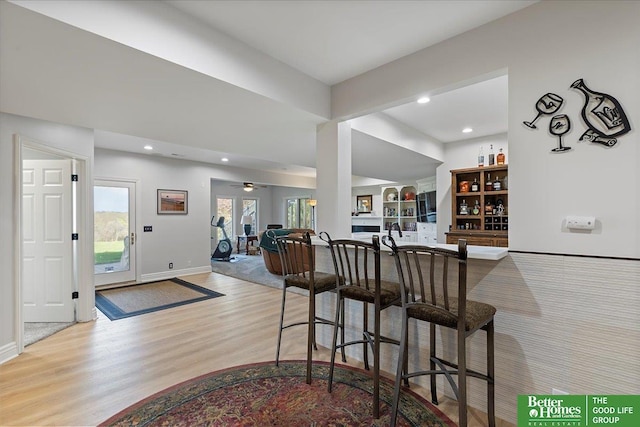 5850 Country Squire Plz, Omaha, NE 68152 - kitchen with light wood-style flooring, baseboards, and recessed lighting