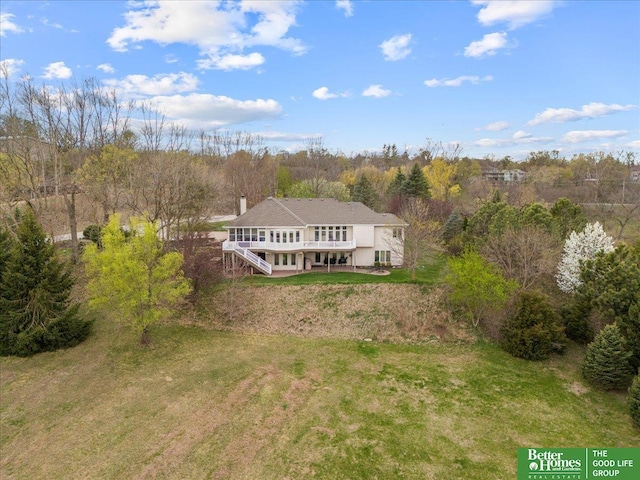 5850 Country Squire Plz, Omaha, NE 68152 - aerial view of property and surrounding area with a forest