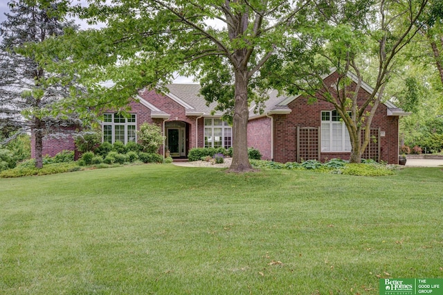 5850 Country Squire Plz, Omaha, NE 68152 - view of front of property with brick siding and a front yard