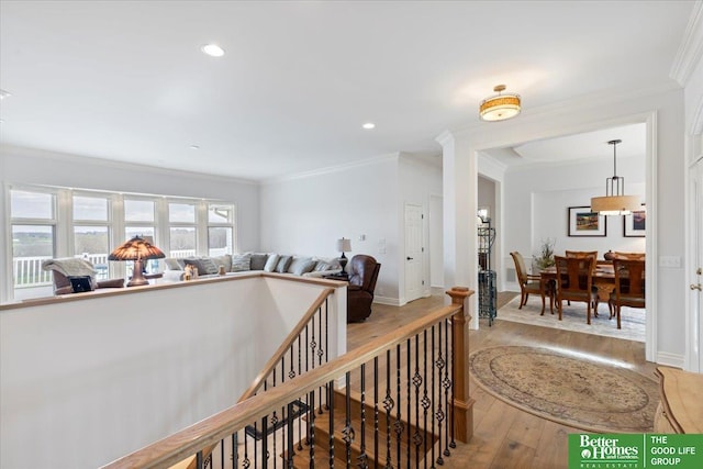 5850 Country Squire Plz, Omaha, NE 68152 - hall featuring wood-type flooring, ornamental molding, recessed lighting, an upstairs landing, and baseboards