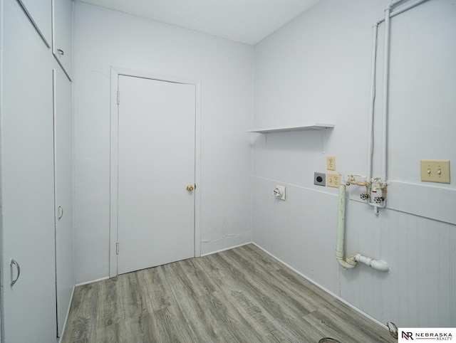 1029 Rose St, Lincoln, NE 68502 - washroom featuring hookup for an electric dryer and light wood-style floors