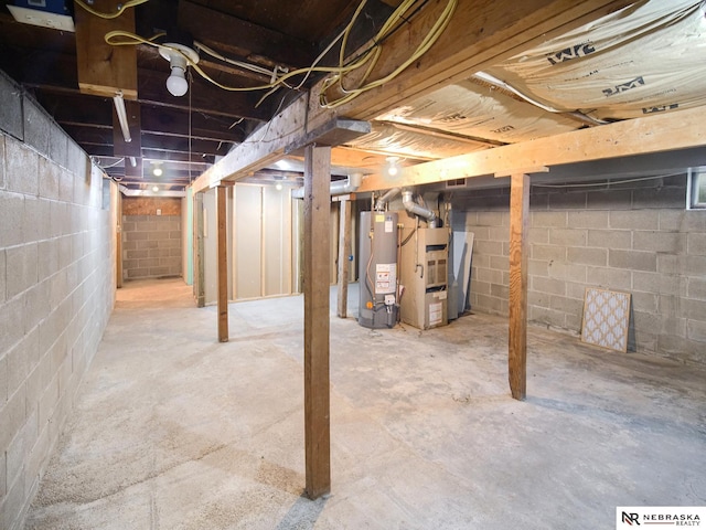 1029 Rose St, Lincoln, NE 68502 - unfinished below grade area with gas water heater and heating unit