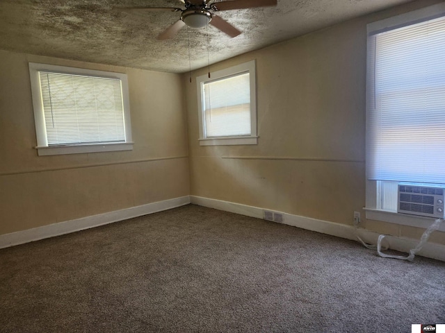 2103 A St, Lincoln, NE 68502 - empty room with ceiling fan, visible vents, baseboards, cooling unit, and carpet