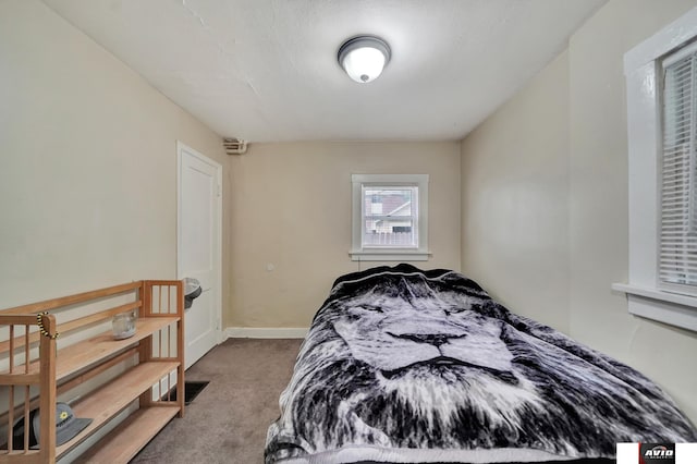 2103 A St, Lincoln, NE 68502 - carpeted bedroom featuring baseboards