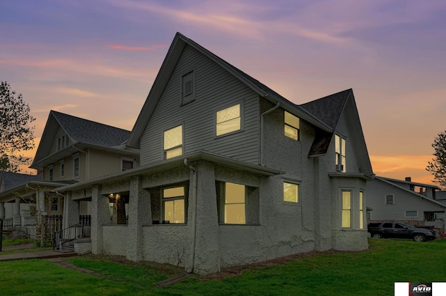 2103 A St, Lincoln, NE 68502 - exterior space featuring a yard and stucco siding
