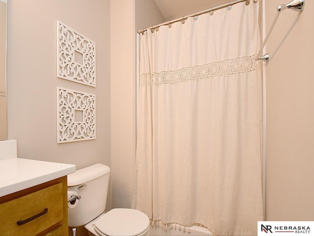 bathroom with vanity, toilet, and a shower with curtain