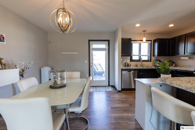 dining area with recessed lighting, a notable chandelier, and dark wood-style floors