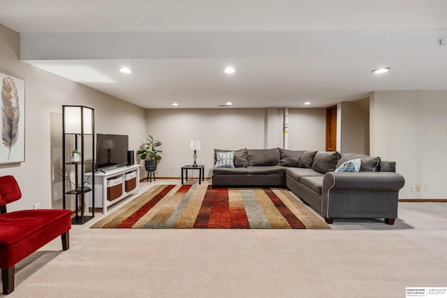 living area featuring baseboards, carpet flooring, and recessed lighting