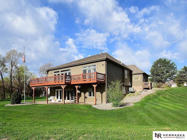 back of property with a patio, a yard, central AC, and a deck